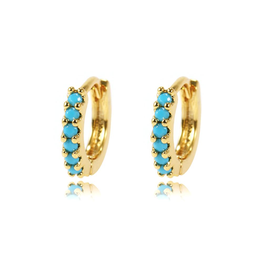 Gold hoop earrings with turquoise stones on a white background