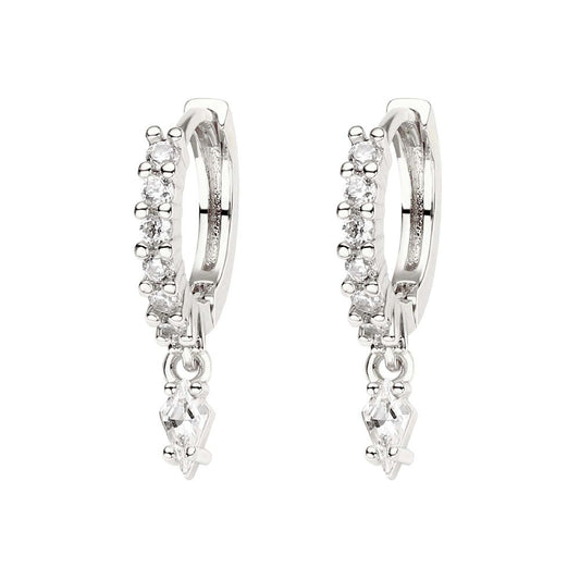 Pair of silver hoop earrings with clear gemstones on a white background