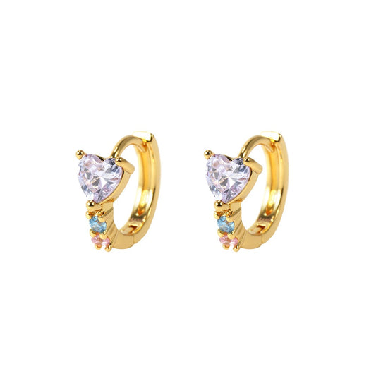 Gold hoop earrings with heart-shaped and round gemstones on a white background